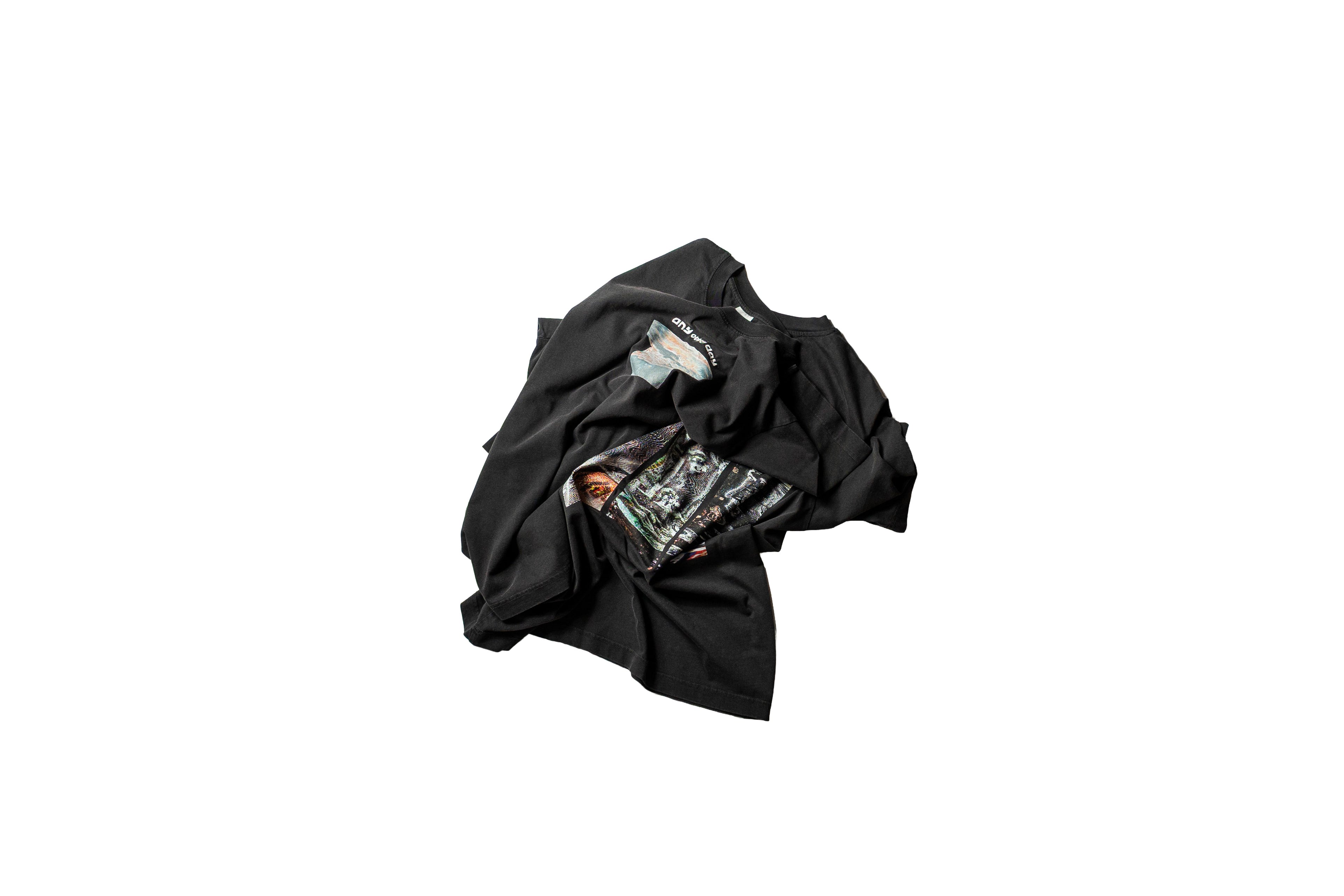 two black vintage washed tshirts with DTG prints wrapped around eachother in a spiral